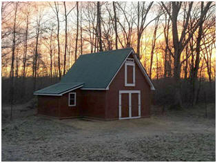 Sunset on a Candlewood Mini-Barn. Click to learn about inexpensive stock plans from architect Don Berg.