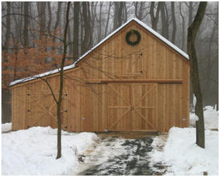 This version of the stock Maple Barn was built in Maryland. Read more and check out the inexpensive building plans at BackroadHome.net
