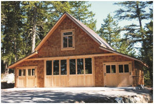 This custom Craftsman-Style four-car garage, in British Columbia was crafted with the help of inexpensive stock pole-barn plans by architect Don Berg.